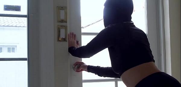  She breaks into a house and the owner surprises her masturbating herself